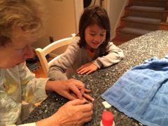 Grammy painting Luca's nails