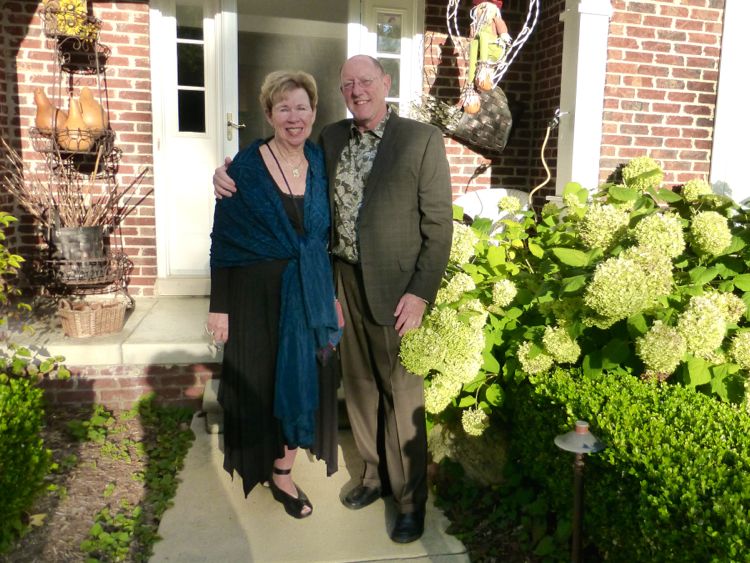 Sharon & Bob in front of Karen & Robert's home