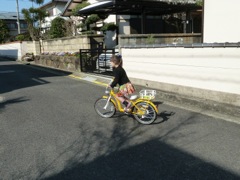 Riding her bike